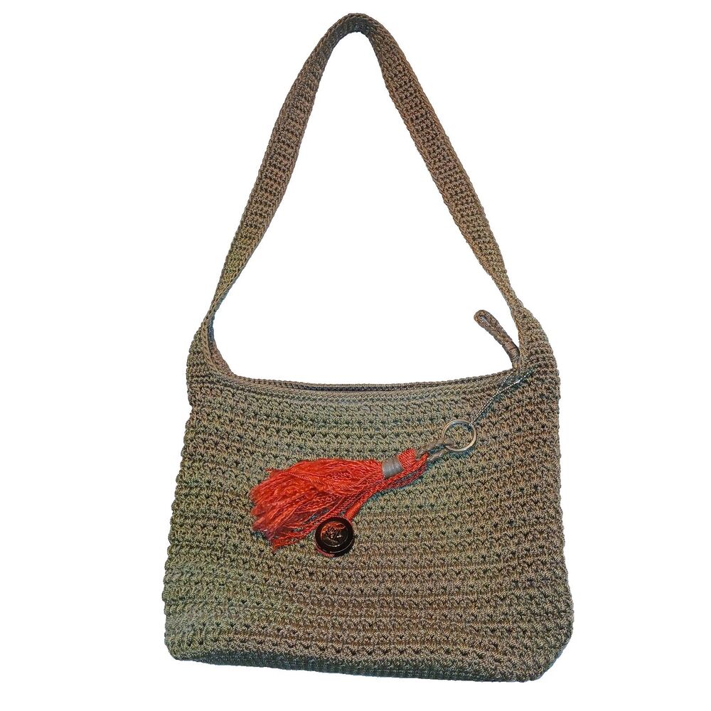 The Sak Crochet Shoulder Bag Purse Beige w/ Red Tassel Charm Zipper Closure